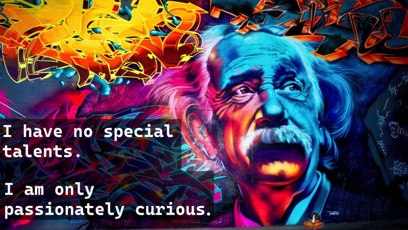 A photo of colourful graffiti depicting Albert Einstein overlaid with the word "I have no special talents. I am only passionately curious."